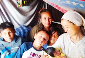 Sister Esperanza Ortiz Macías with some of those she helps