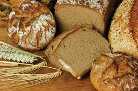Loaves of bread with grain stalks
