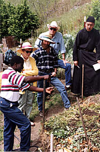 John Okomba, Kenya, teaching composting at a tour in Willits, CA